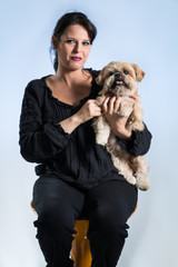 woman posing with her dog