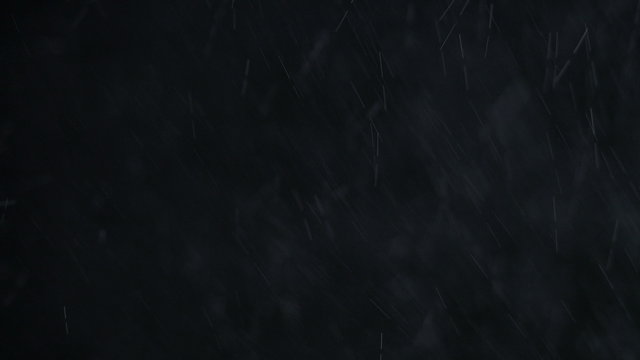 Snow falling background. 4K UHD 2160p footage.
