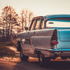 Old retro or vintage car back side. Vintage effect processing