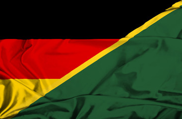 Waving flag of Solomon Islands and Germany