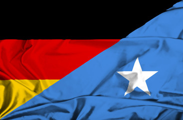 Waving flag of Somalia and Germany