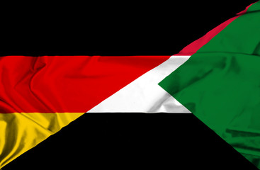 Waving flag of Sudan and Germany