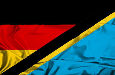 Waving flag of Tanzania and Germany