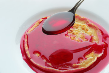 pancake with cherry syrup