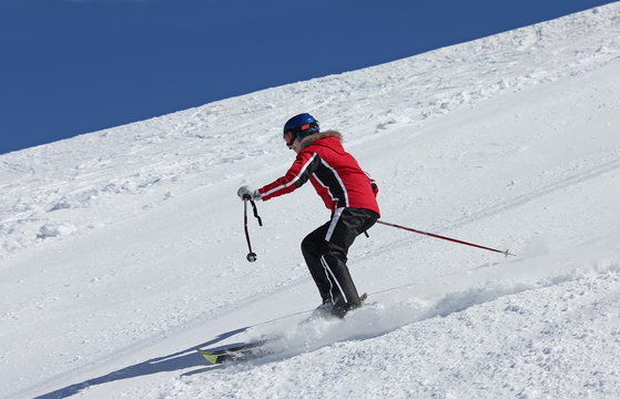 Skier on the slope at the mountains