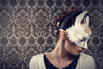 carnival girl with white mask