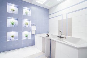 Fototapeta na wymiar Bright modern bathroom with enormous bathtub