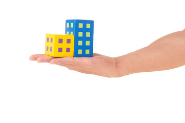 Wooden toy's Building in hand on White Isolated background