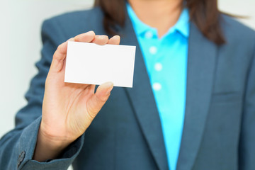 Fototapeta premium Business woman holding name card