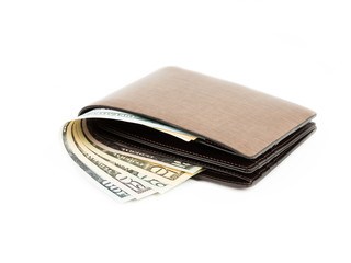 Money in brown leather wallet on white background