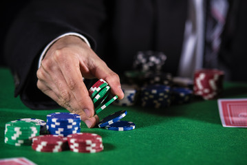 Fototapeta na wymiar Man betting on the casino