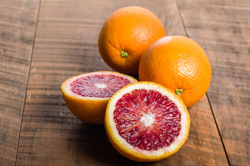 Blood oranges with cut showing interior