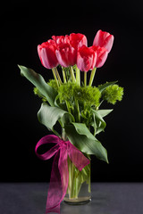Red tulips in vase