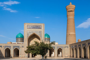 Mosque Kalon and Kalyan minaret in Bukhara, Uzbekistan - obrazy, fototapety, plakaty