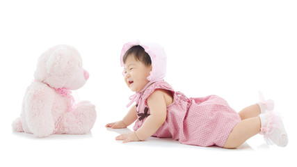 6 months old asian baby playing with toy