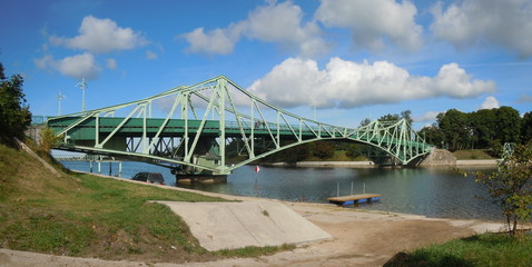 Fototapeta premium Panoramic view of metal bridge