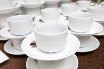 Catering - rows of cups served for tea table