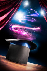 High contrast image of magician hat on a stage - obrazy, fototapety, plakaty