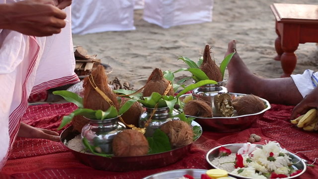 hindu brahmins preparing the place for Indian wedding ceremony