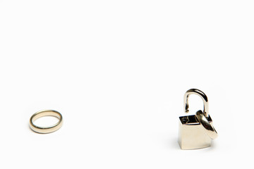 Divorce - wedding ring on open padlock