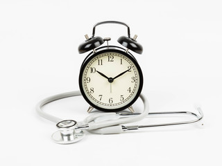 Alarm clock with stethoscope concept healthcare time