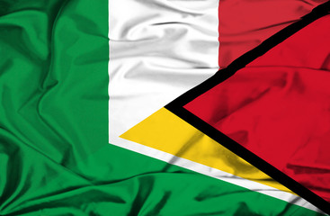 Waving flag of Guyana and Italy