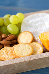 toasts with nuts, cheese and grapes