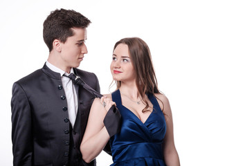 Girl pulls her boyfriend tie. Valentine Couple.