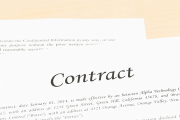 Business contract document with glasses