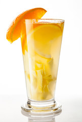 fruit ice tea in glass coctail with orange