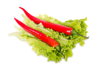 Two chili peppers and lettuce