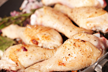 Roast chicken in a pan