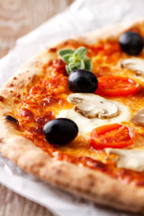 Pizza with olives and mushrooms