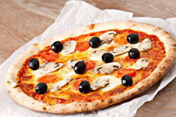Pizza with olives and mushrooms