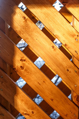 wood wall on the winter time .Stack of Brown wood