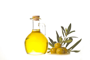 Extra olive oil bottle and olives