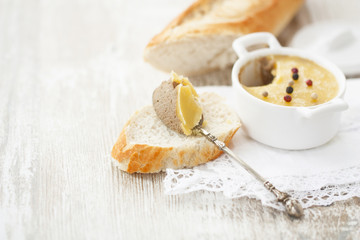 liver pate on a slice of baguette
