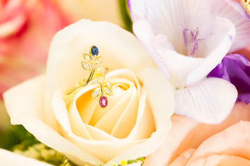 diamond ring on rose