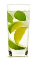 Glass of water with lime and mint isolated on white