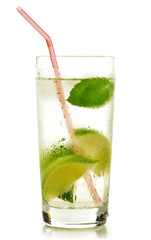 Glass of water with lime and mint isolated on white