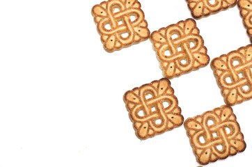 Square tea biscuits. Background. Photo.