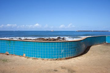 Wall with Blue Tiles by the Ocean