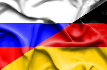 Waving flag of Germany and Russia