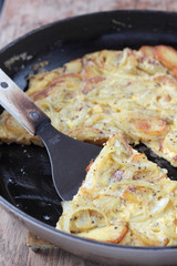 Classic spanish tortilla with potatoes and onions.