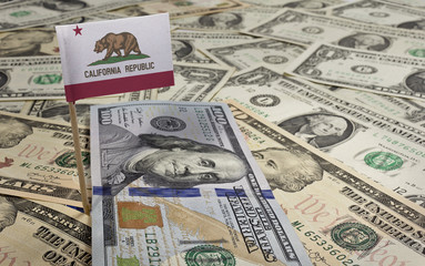 Flag of California sticking in various american banknotes.(serie