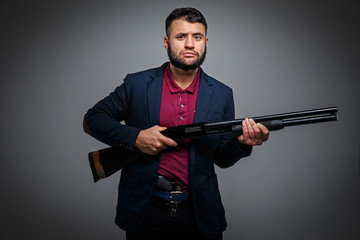 Powerful businessman with a gun