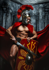 Fototapeta na wymiar Roman warrior with muscular body holding sword and shield
