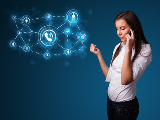 Pretty girl making phone call with social network icons