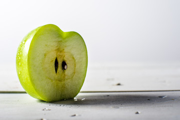 Juicy slice of Granny Smith Apple