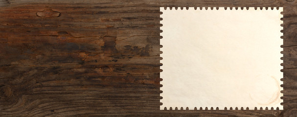 stamp blank paper wooden table background panorama